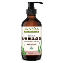 Banyan Botanicals Kapha Massage Oil bottle with Chitrak and Tulsi, warming for self-massage rituals.