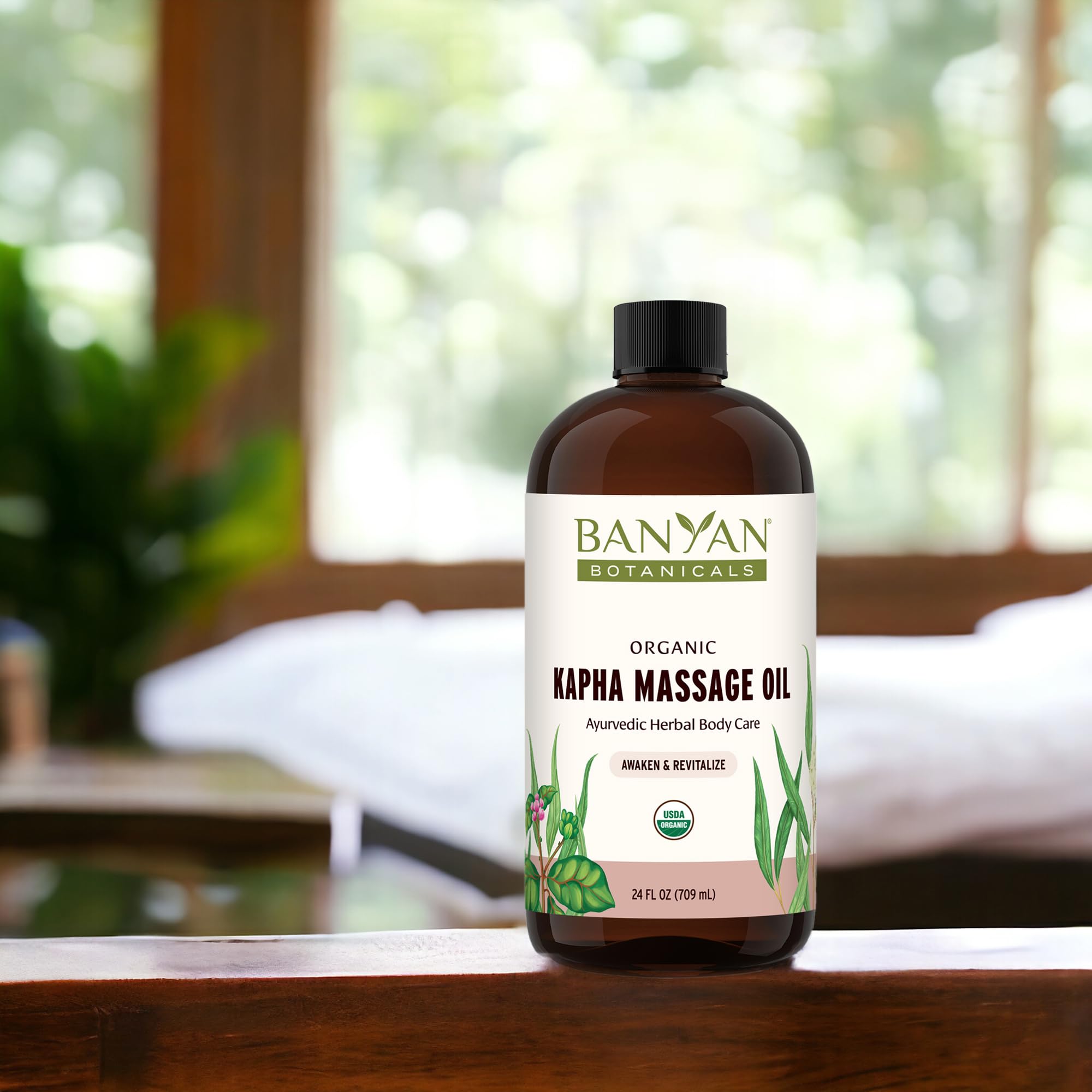 Banyan Botanicals Kapha Massage Oil warmed for winter self-massage sessions.