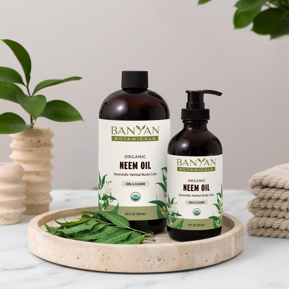 Neem Oil label close-up highlights organic, sustainably sourced promise.