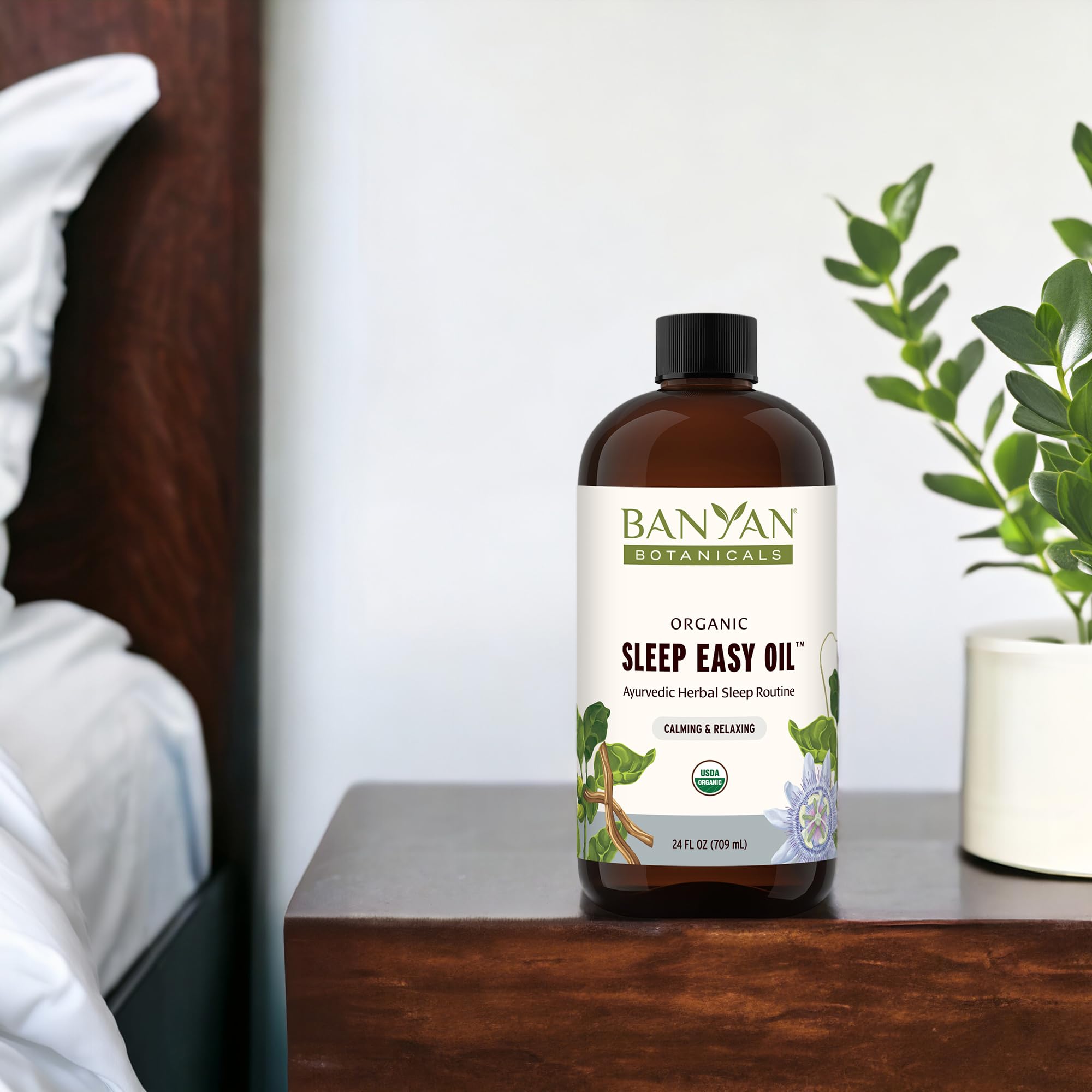 Banyan Botanicals Sleep Easy Oil applied to temples and soles for tranquil evening ritual