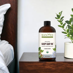 Banyan Botanicals Sleep Easy Oil applied to temples and soles for tranquil evening ritual