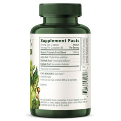 Banyan Botanicals Triphala tablets arranged for a daily routine