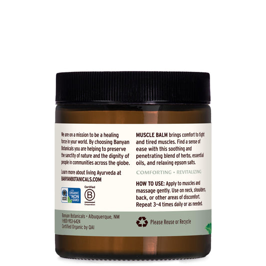Banyan Botanicals Muscle Balm being applied on forearm for a soothing massage
