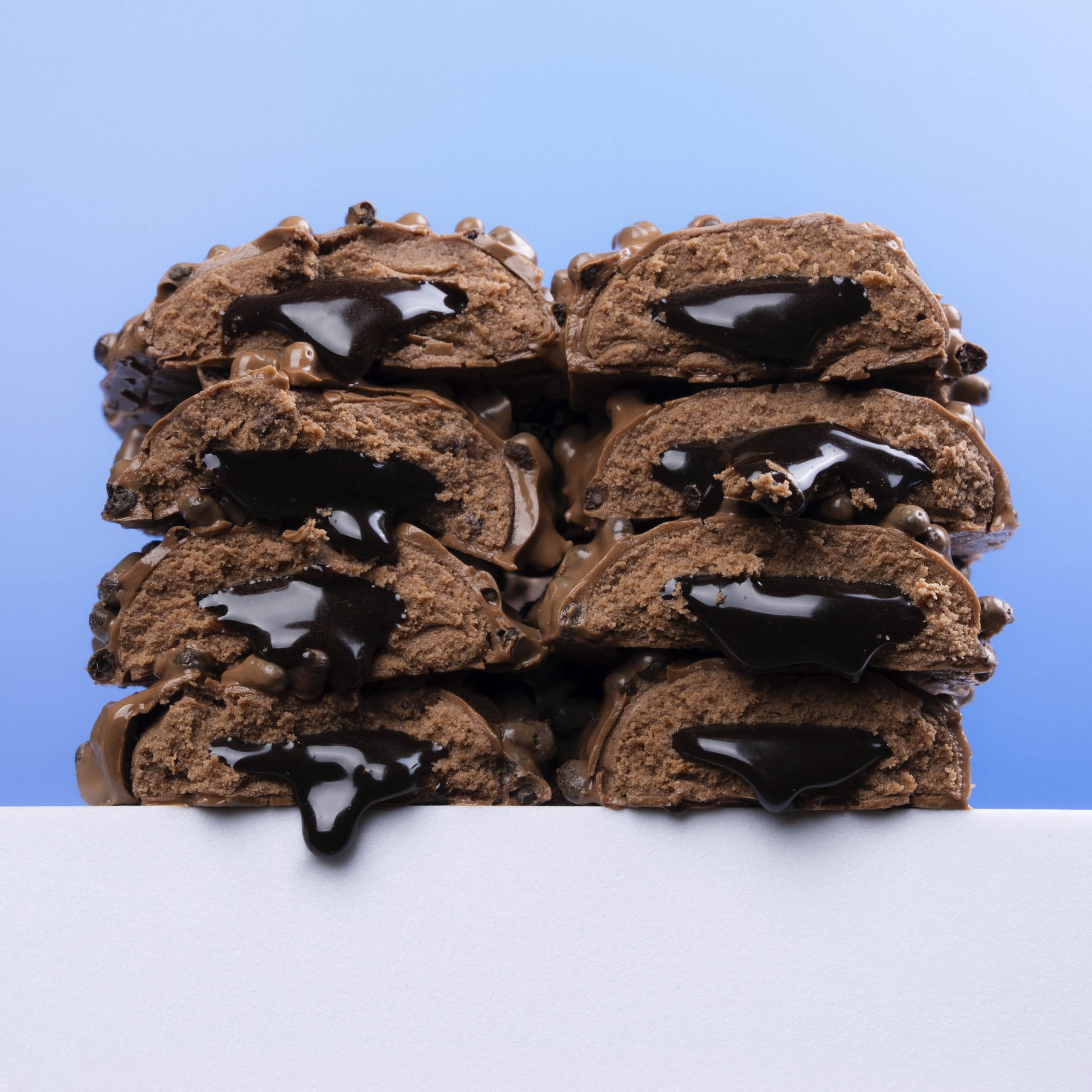 Barebells brownie batter bar chocolate coating shown in dessert-like texture.