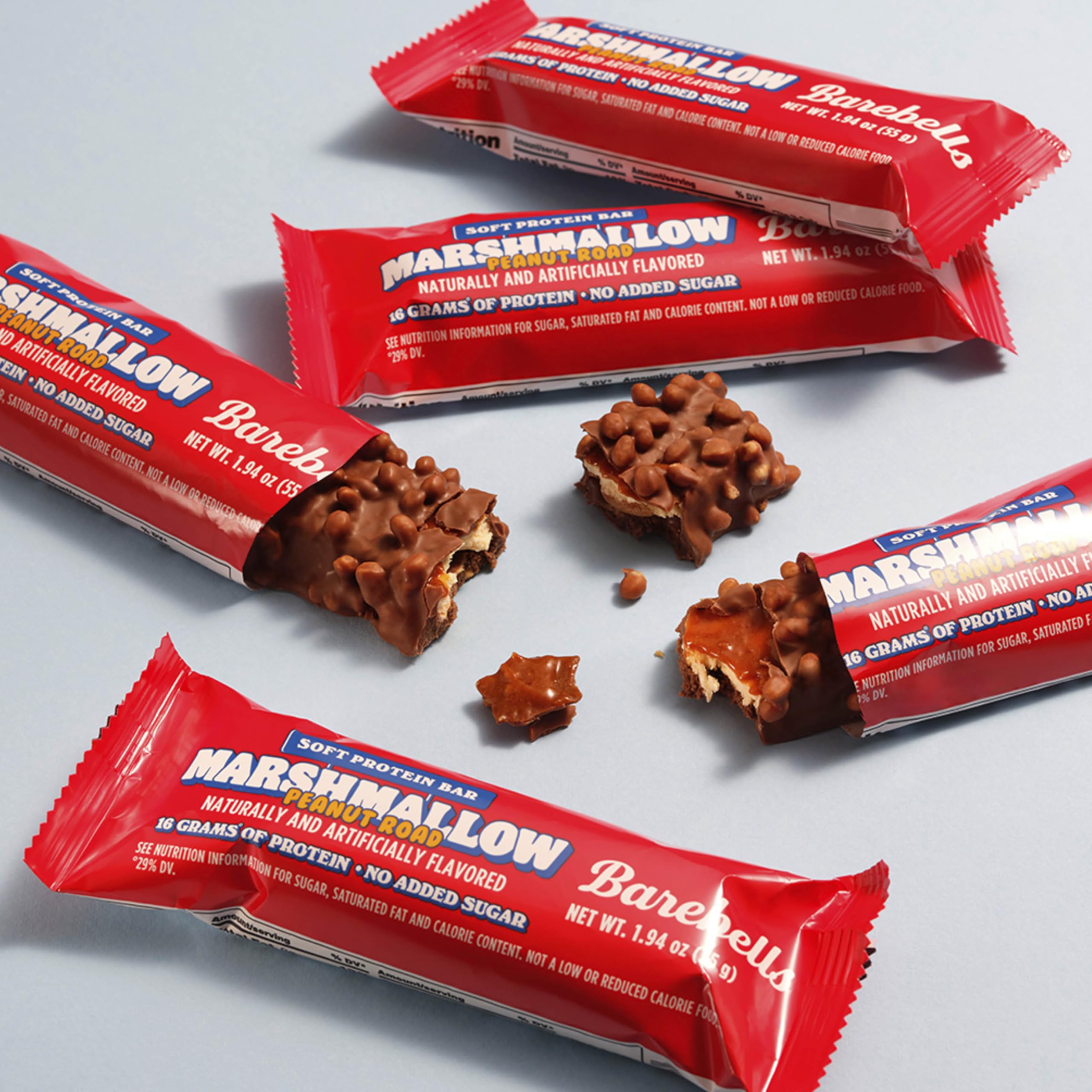 Visible peanuts in Barebells Marshmallow Road bar make a crunchy protein snack.