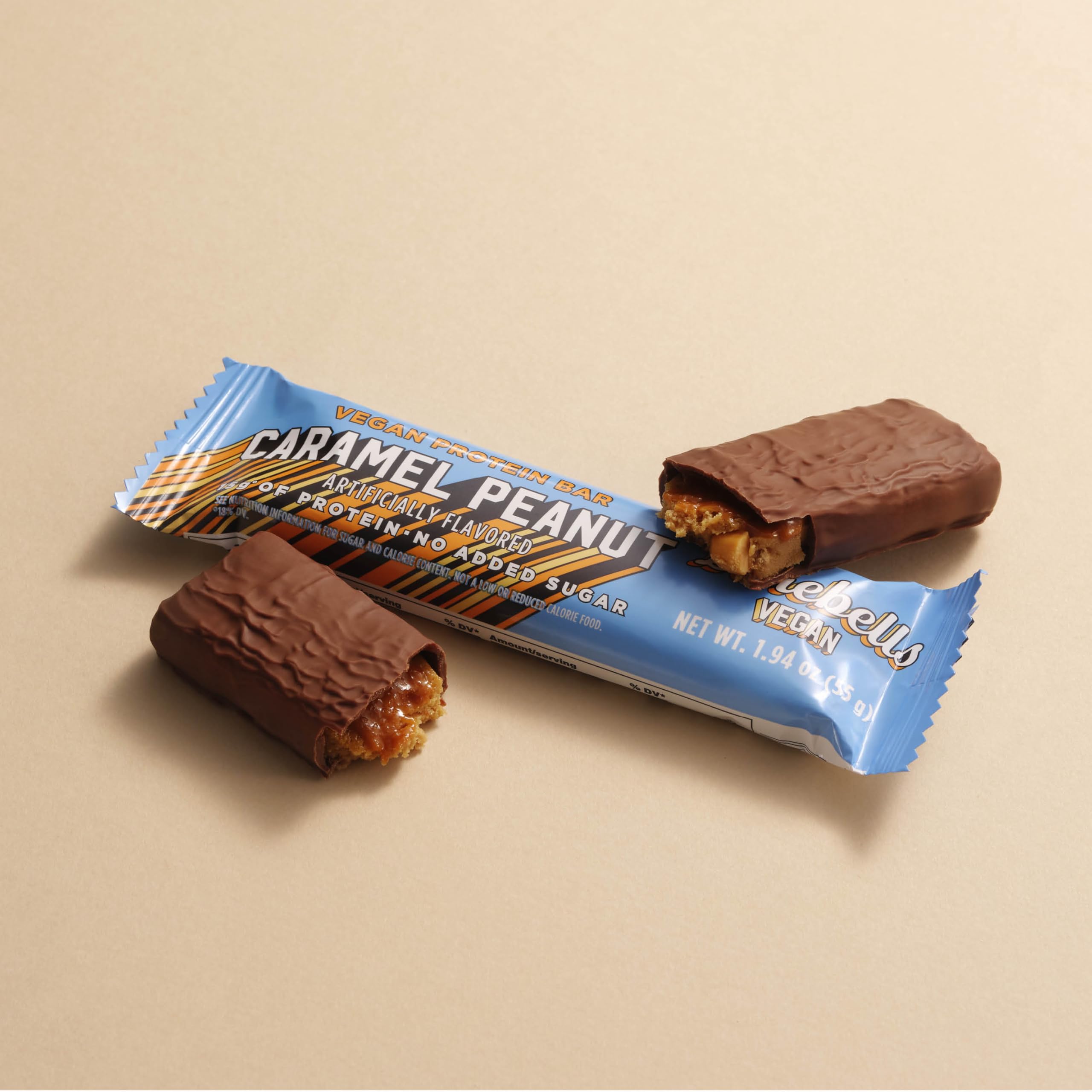 Barebells vegan peanut caramel bar breakfast option on kitchen counter.