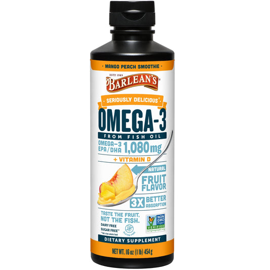 Barlean's Omega 3 Mango Peach liquid poured into a spoon for easy daily use.