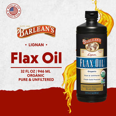 Barlean's Organic Lignan Omega-3 flaxseed oil being poured into a spoon.