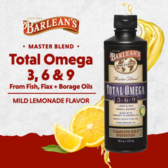 Pouring Barlean's Total Omega 3-6-9 into juice for easy daily use.