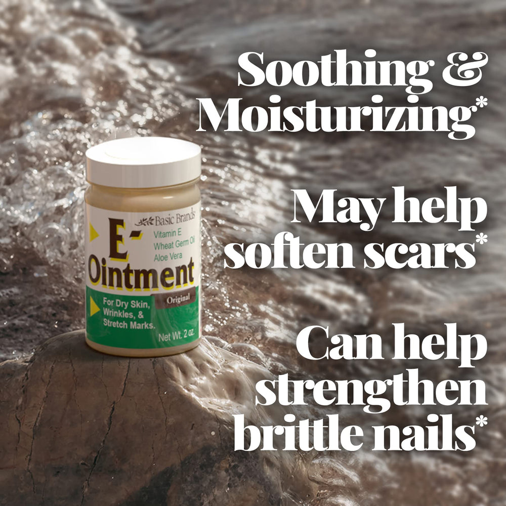 Basic Brands Vitamin E Ointment texture closeup highlights creamy consistency for smoothing skin.
