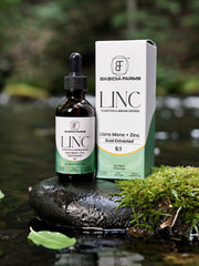 Basidia Farms LINC amber tincture bottle signals premium quality.