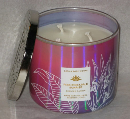 Bath & Body Works White Barn 3-Wick Candle Pink Pineapple Sunrise brightens spaces with tropical aroma.