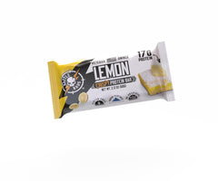 Battle Bars Lemon Almond bar on desk ready for recovery snack.