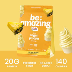 BE AMAZING vegan protein powder Dole Whip Pineapple shake being poured for a tropical, low-carb sip
