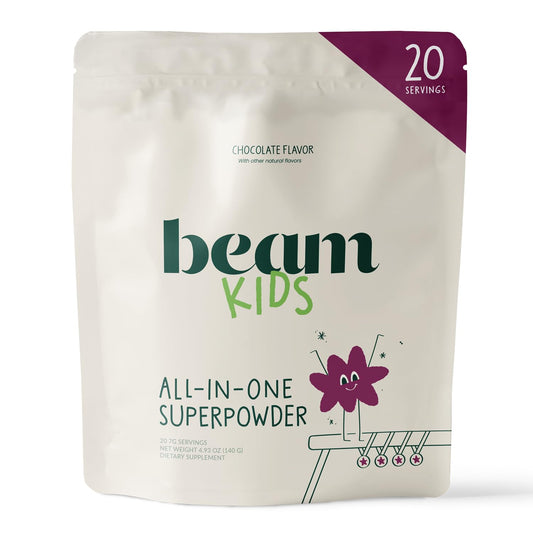 Beam Kids Multivitamin Powder scoop stirred into milk for daily nutrition.