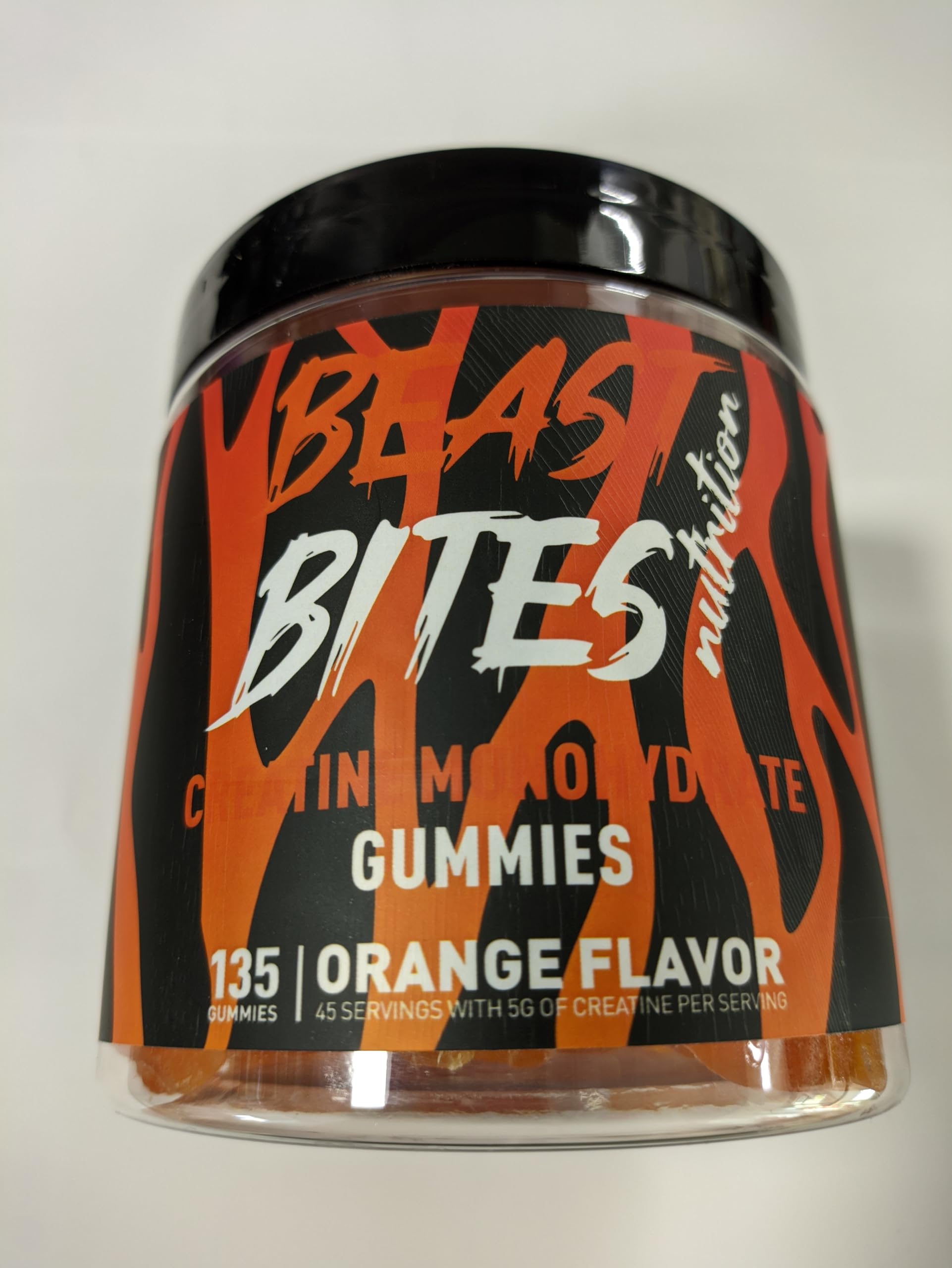 BEAST BITES Nutrition Creatine Monohydrate Gummies jar front label highlights orange flavor and 5g per serving for support