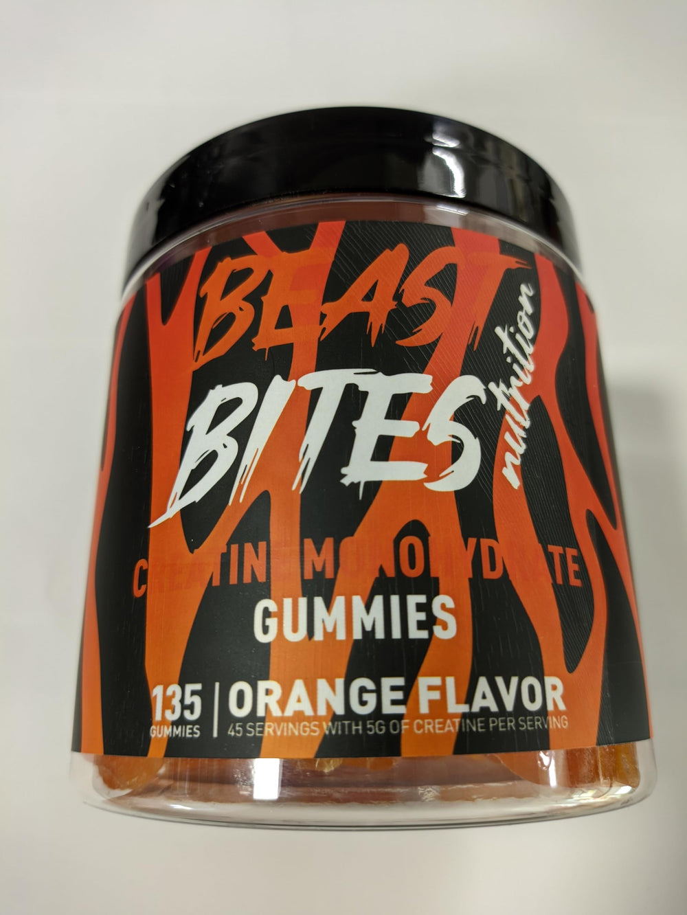 BEAST BITES Nutrition Creatine Monohydrate Gummies jar front label highlights orange flavor and 5g per serving for support