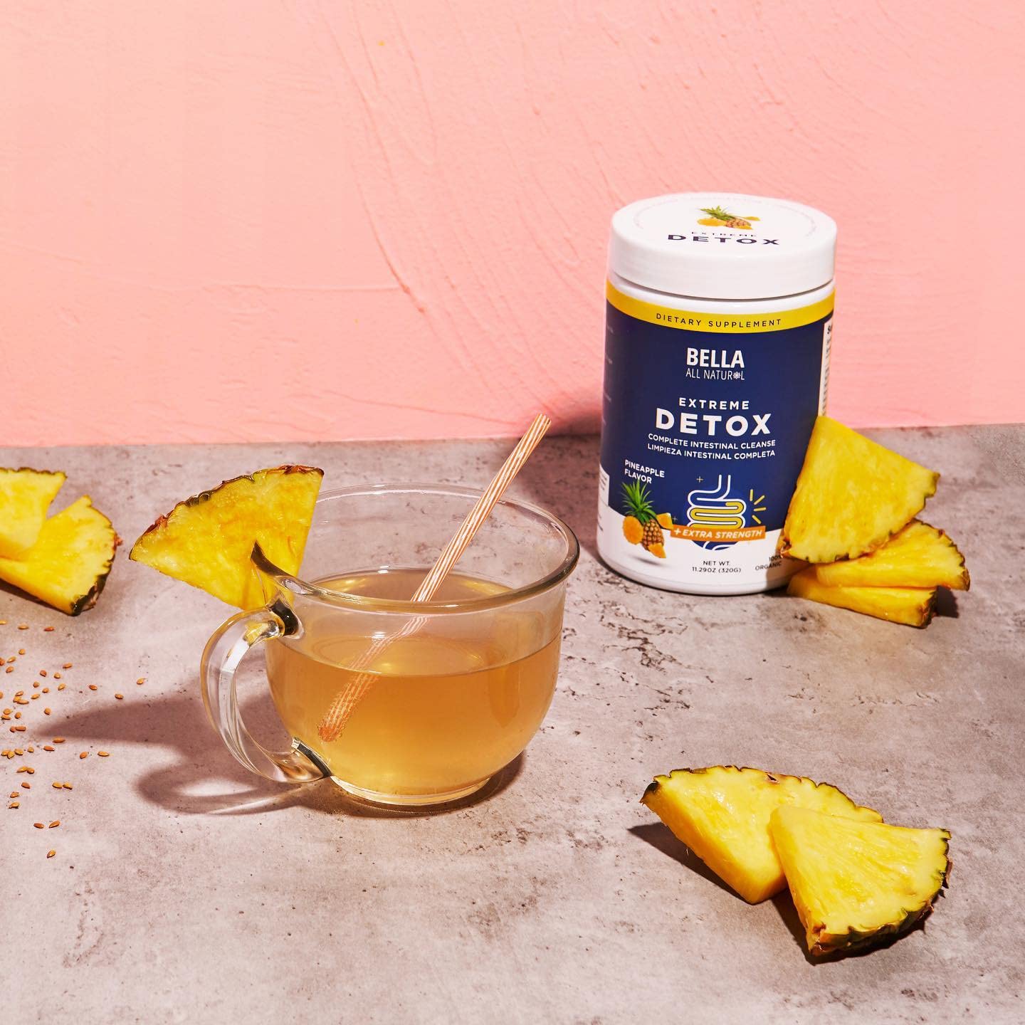 Bella All Natural Extreme Detox Pineapple glass with liquid conveys tropical refreshment and wellness