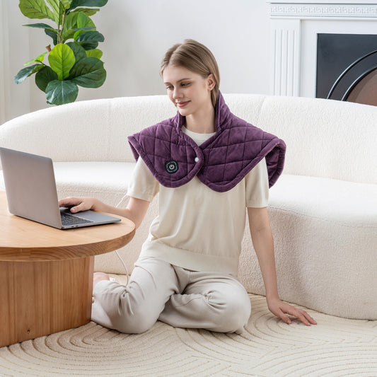 Berkshire Blanket weighted heating pad wrapped around back for soothing heat.