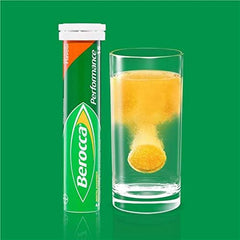 Berocca Orange glass with fizz showing vibrant color and citrus scent.