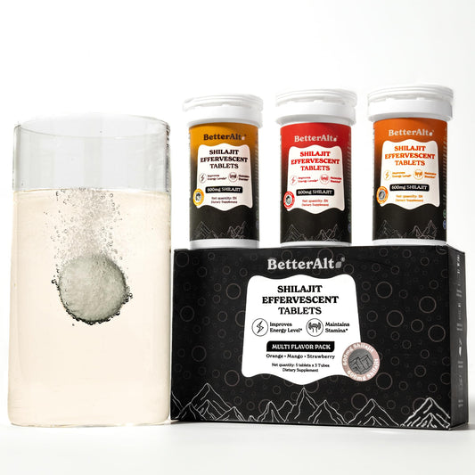 Better Alt Mango flavor effervescent tablet dissolving in water for a refreshing energy boost.