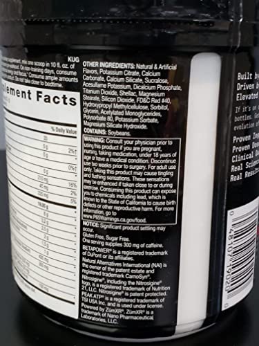 BEYOND RAW LIT powder poured into glass showing sweet-tart flavor.