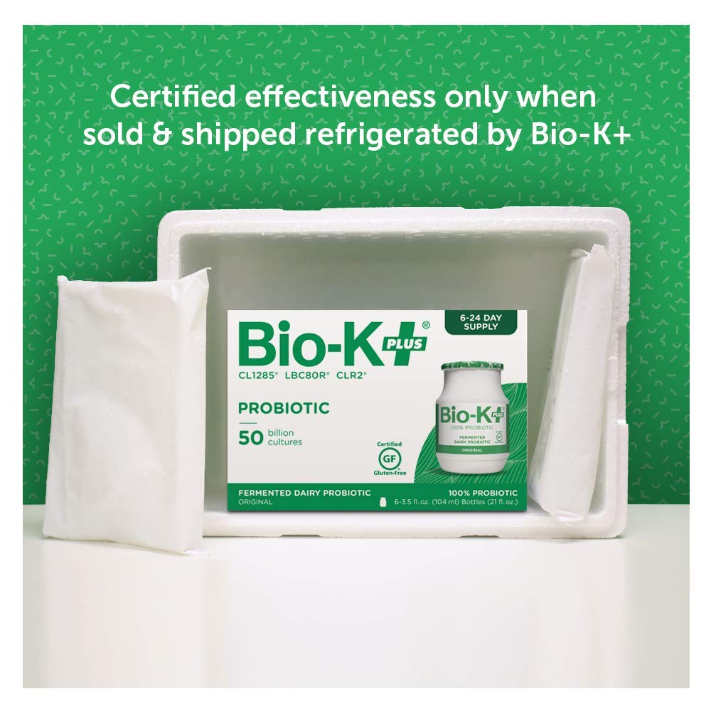 Bio-K Plus bottle being poured highlights convenient, on-the-go probiotic consumption.
