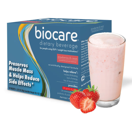 Biocare Strawberry Crème Shake served in a glass, showcasing creamy texture.