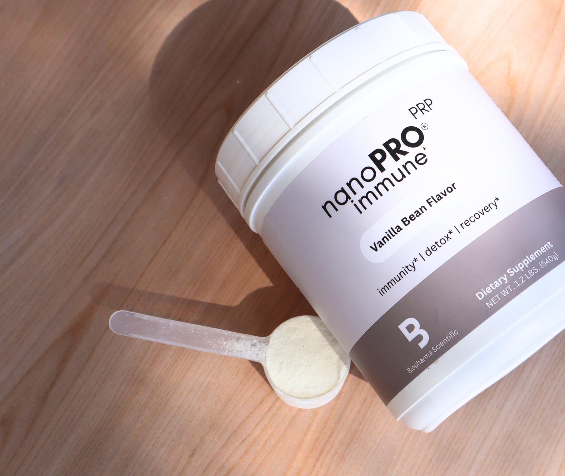 Product label highlights grass fed whey isolate quality and sourcing