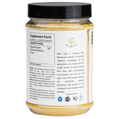 Bixa Botanical Bibhitaki powder dose spoon ready for easy measurement in smoothies.