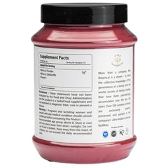 Close-up of Bixa Botanical Hibiscus Powder texture showing vibrant color and purity.