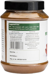 Close-up of Bixa Botanical Pomegranate Peel Powder jar to highlight texture and purity