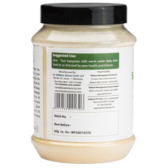 Bixa Botanical Safed Musli powder measuring scoop demonstrates easy daily dosage.