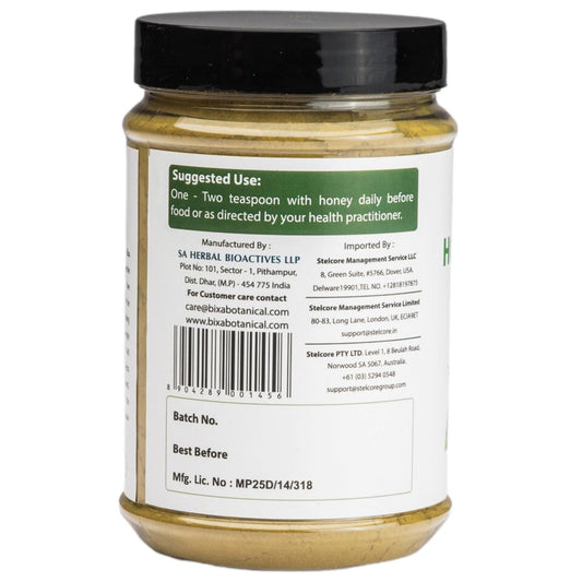 Bixa Botanical Tulsi powder with scoop for precise measurement