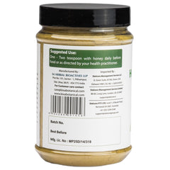Bixa Botanical Tulsi powder with scoop for precise measurement