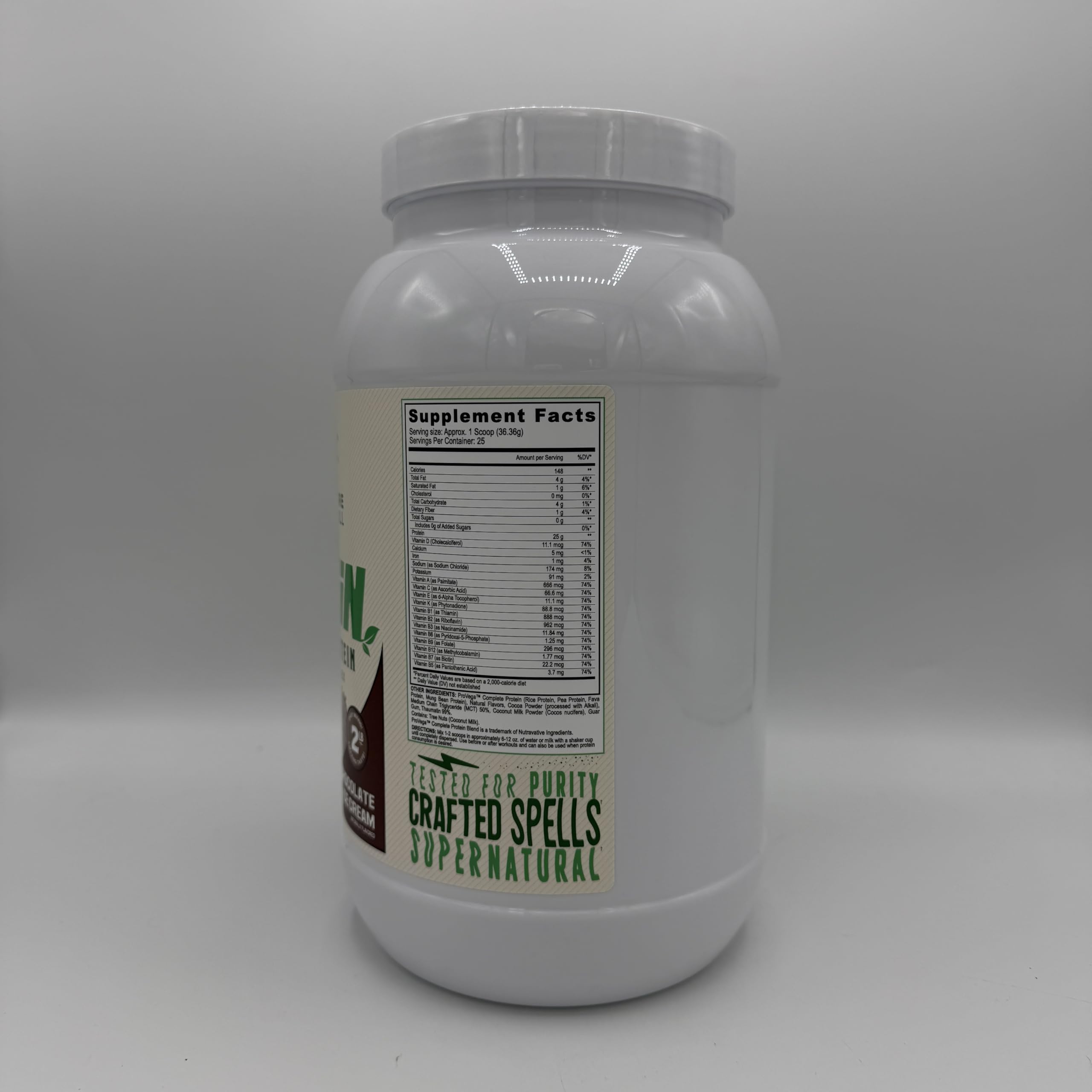 Close-up on Black Magic dairy-free label on the protein tub