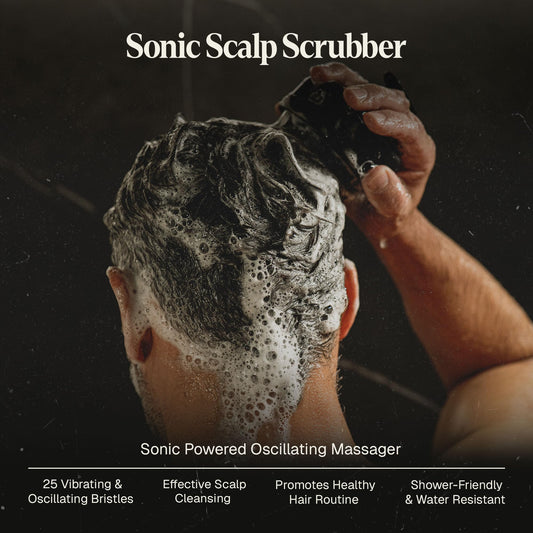 Black Wolf Sonic Scalp Scrubber in shower demonstrating ergonomic grip for comfortable cleansing