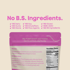 Blender Bombs Bomb Plant Protein scoop beside vanilla powder for easy measurement.
