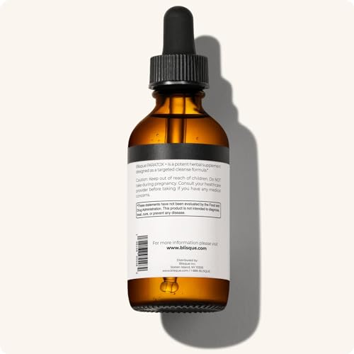 Bottle of Blisque PARATOX+ beside a glass of water