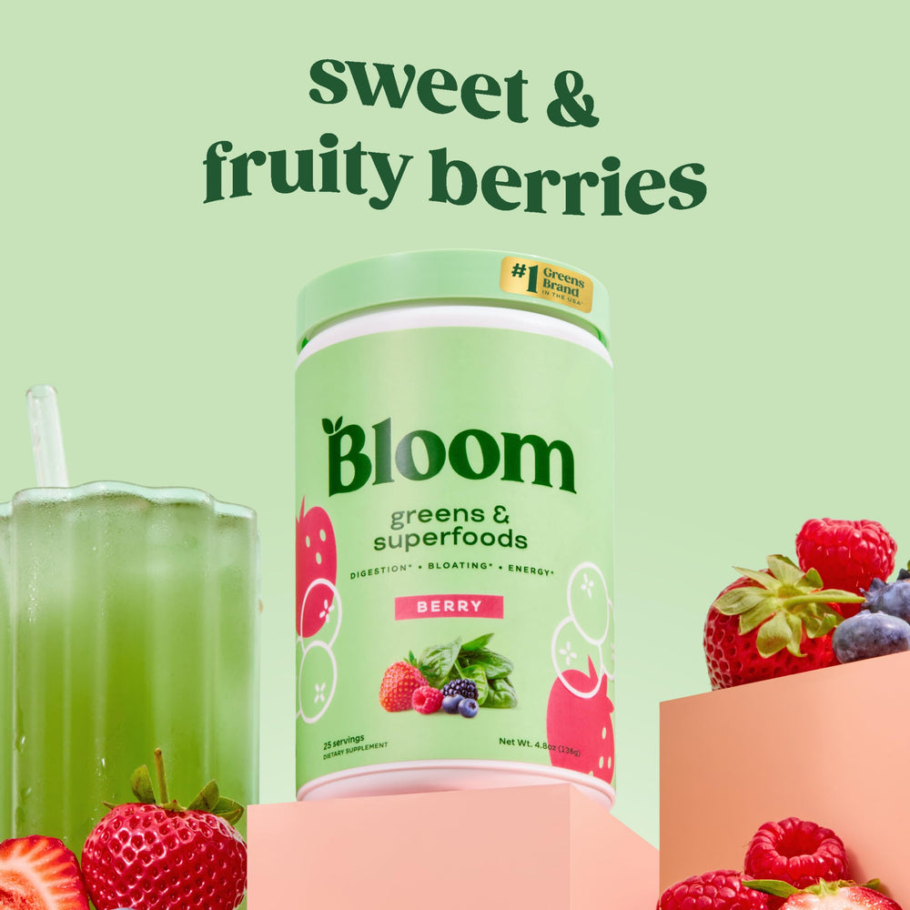 Bloom Nutrition greens powder scoop poured into a glass for a convenient energy boost.