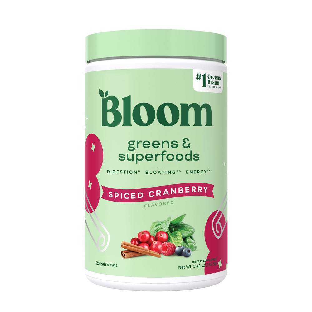 Bloom Nutrition Greens Powder tub with scoop offers a convenient daily nutrient boost
