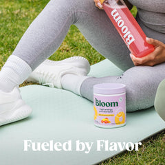 Bloom Nutrition High Energy Pre Workout powder scoop image highlights no artificial colors and sugar-free promise