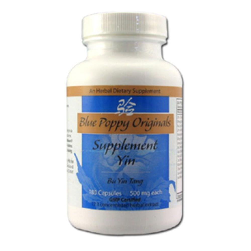 Blue Poppy Yin bottle on desk, promoting balanced energy and calm focus