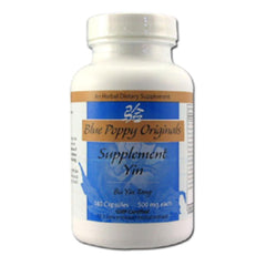 Blue Poppy Yin bottle on desk, promoting balanced energy and calm focus