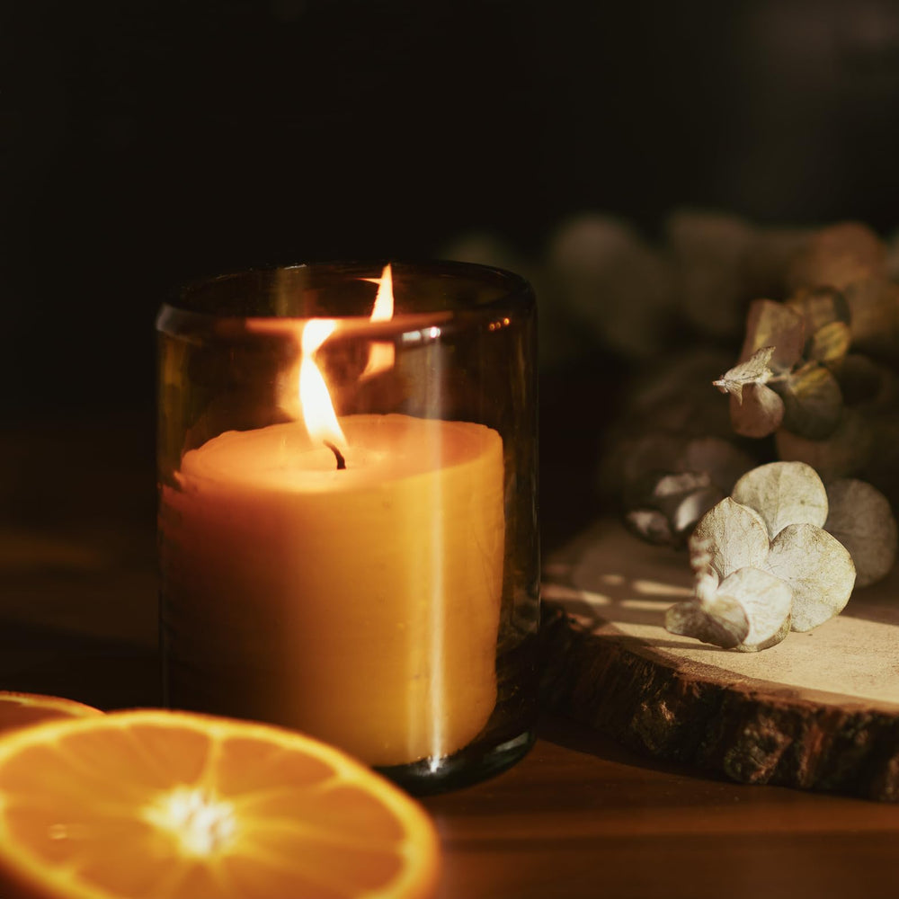 Bluecorn candle complements dining room decor with subtle vanilla glow