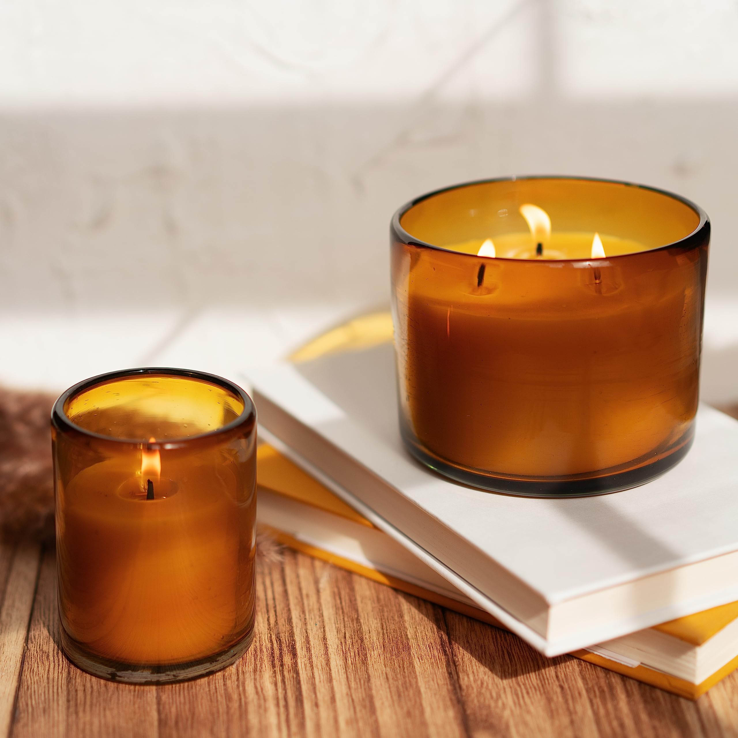 Bluecorn Beeswax large candle in amber vessel complements winter centerpieces.