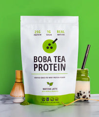 Glass of Boba Tea Protein Matcha Latte shows creamy texture with real matcha.