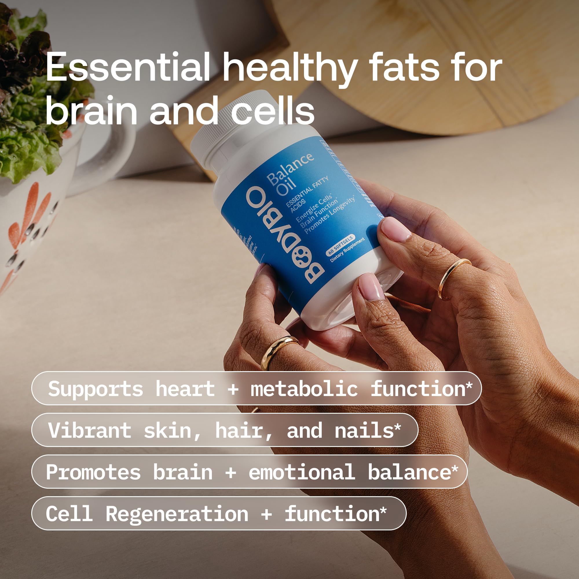 BodyBio Balance Oil ingredients visuals reveal cold-pressed oils for nutrient preservation.