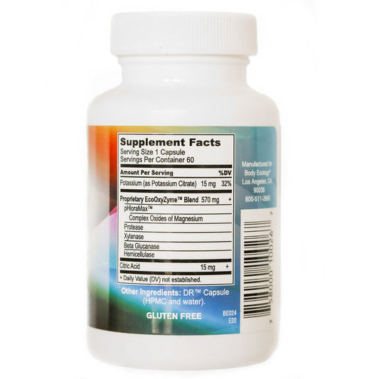 Body Ecology EcoOxyZyme capsules in hand highlight easy, portable support for digestion and immunity.