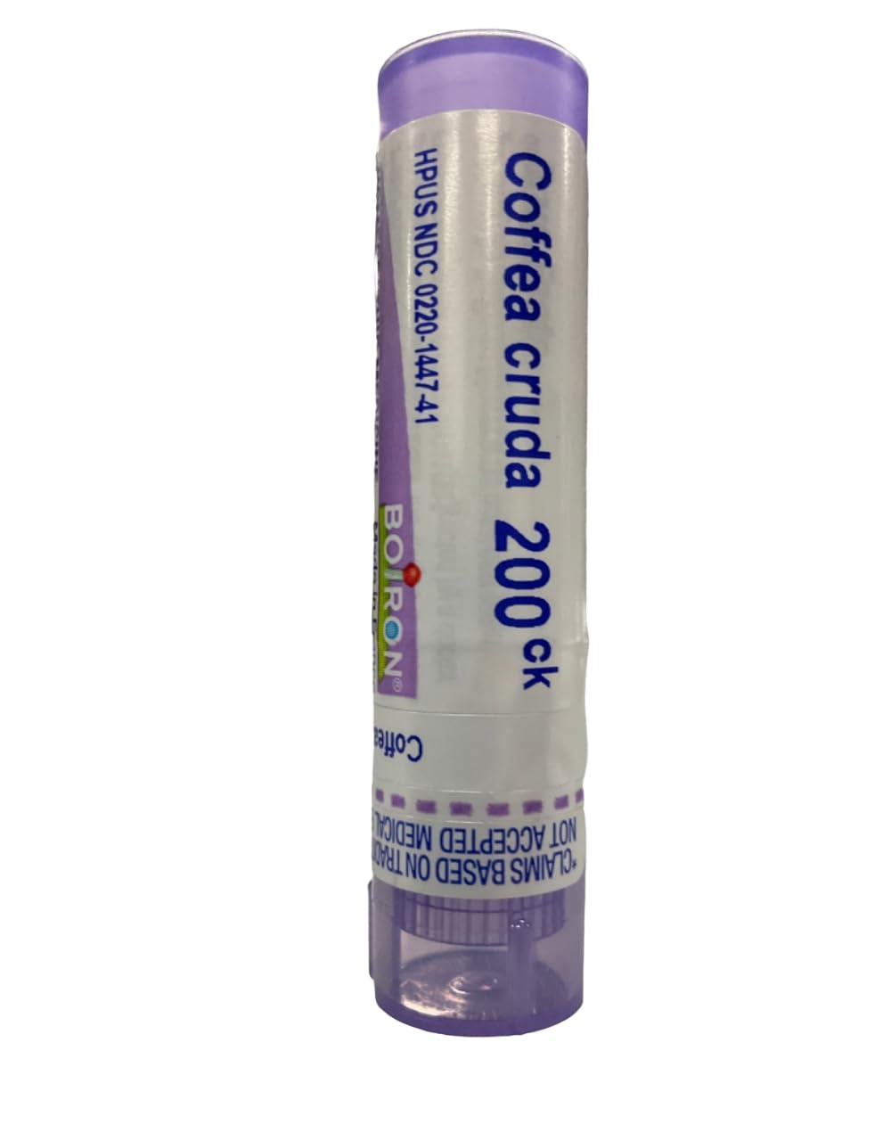 Coffea Cruda 200CK pellets dissolving under the tongue for quick use.
